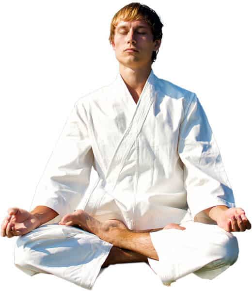 Martial Arts Lessons for Adults in Lake Jackson TX - Young Man Thinking and Meditating in White
